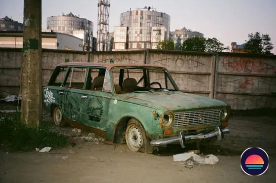 Rusty, storm-battered older sedan, showing the range of cars Miami Car Buyer accepts